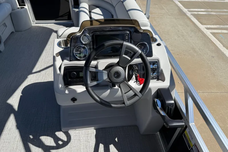 Slide: The Image of Steering console of 2026 Avalon Venture 85 Versatile Rear Bench pontoon boat. - 17