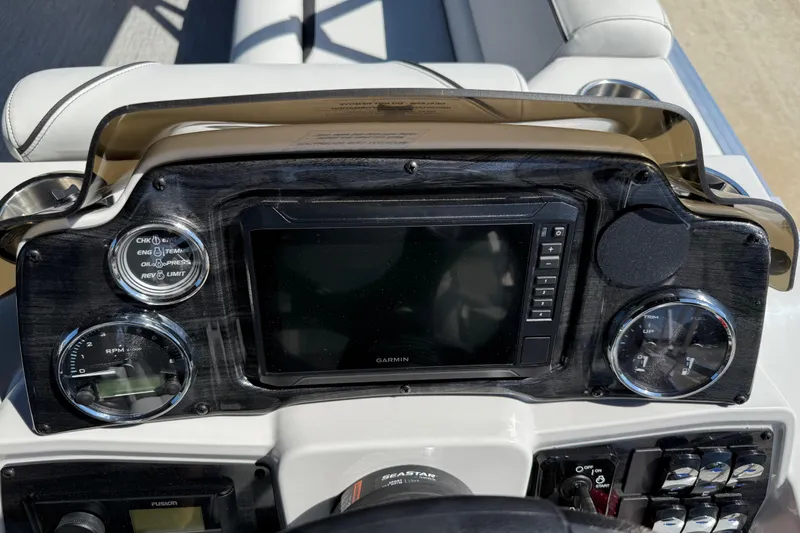 Slide: The Image of Dashboard of 2026 Avalon Venture 85 Versatile with Garmin display and gauges. - 18