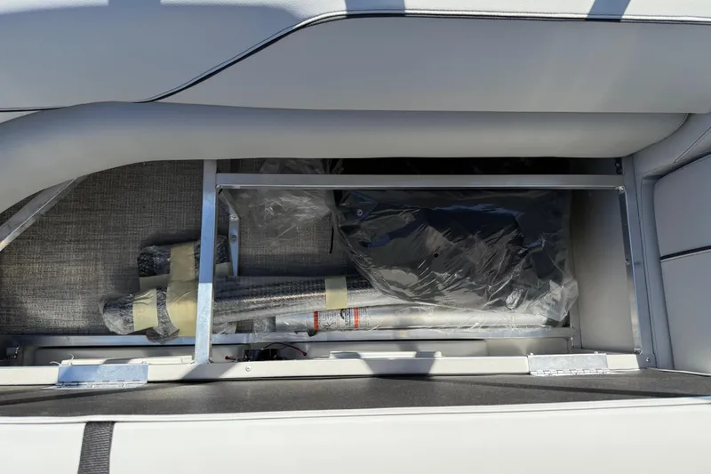 Slide: The Image of 2026 Avalon Venture 85 Versatile rear bench storage compartment with wrapped accessories. - 43