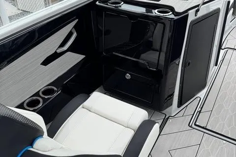 Slide: The Image of 2023 Yamaha Boats 222XD interior with sleek seating and modern console design. - 12