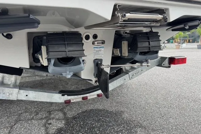 Slide: The Image of 2023 Yamaha Boats 222XD jet propulsion system on trailer, rear view. - 16