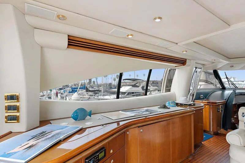 Slide: The Image of Luxurious interior of 1998 Sunseeker Predator 80 yacht with elegant wood finishes. - 13