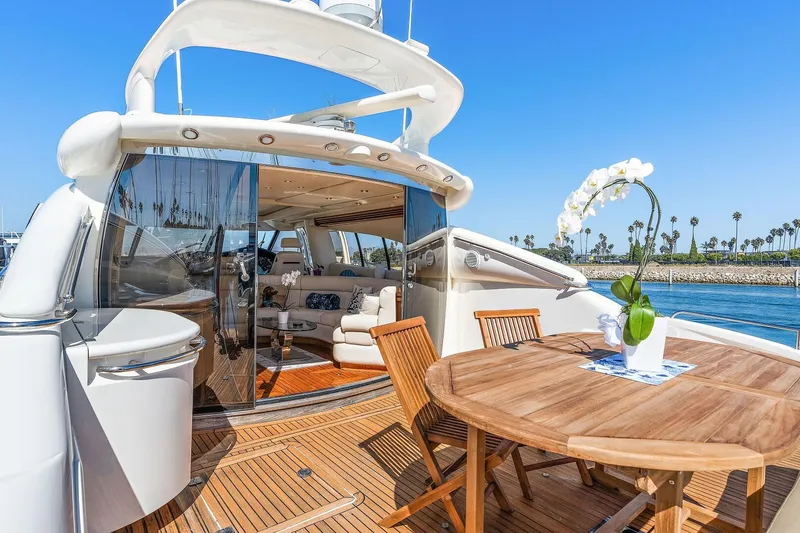 Slide: The Image of Luxurious 1998 Sunseeker Predator 80 yacht with elegant deck and seating area. - 22