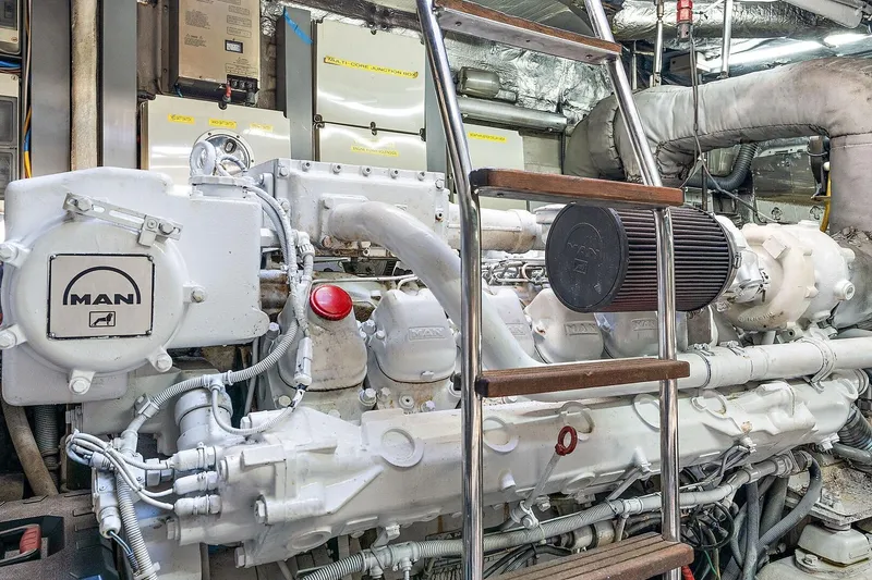 Slide: The Image of Engine room of 1998 Sunseeker Predator 80 yacht with MAN engine components. - 23