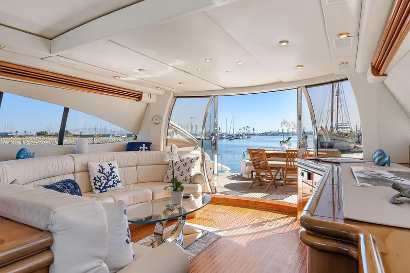 Slide: The Image of Luxurious interior of 1998 Sunseeker Predator 80 yacht with marina view. - 9