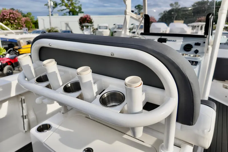 Slide: The Image of 2024 Bayliner TROPHY 22 CX boat interior with rod holders and seating. - 13