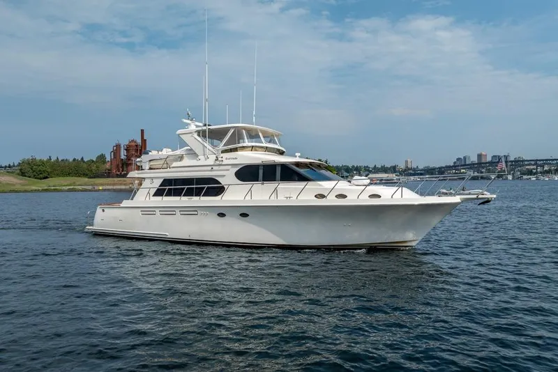 The Image of 2005 Ocean Alexander 64 Motoryacht cruising on a scenic waterway. - 0
