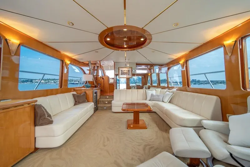 Slide: The Image of Luxurious interior of 2005 Ocean Alexander 64 Motoryacht with elegant seating and panoramic windows. - 11