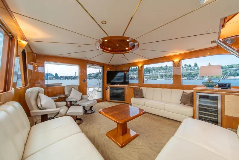 Slide: The Image of Luxurious interior of 2005 Ocean Alexander 64 Motoryacht with elegant seating and scenic views. - 14