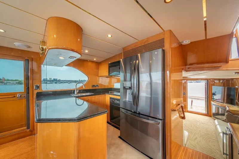 Slide: The Image of Luxurious kitchen interior of 2005 Ocean Alexander 64 Motoryacht with modern appliances and waterfront view. - 18