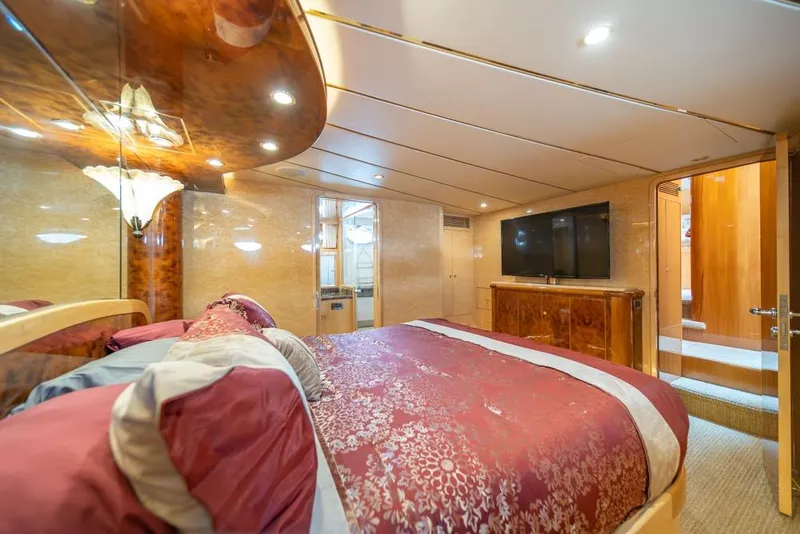 Slide: The Image of Luxurious bedroom interior of 2005 Ocean Alexander 64 Motoryacht with elegant wood finishes. - 28