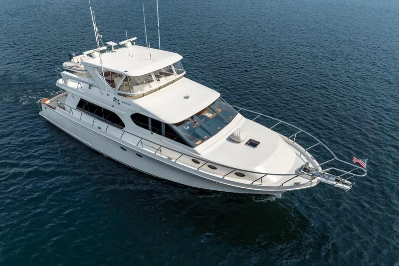 Slide: The Image of 2005 Ocean Alexander 64 Motoryacht cruising on open water. - 3