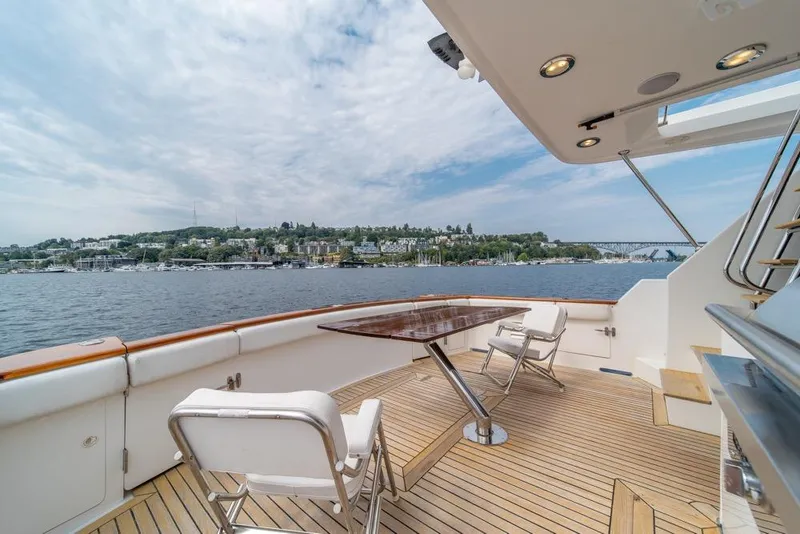 Slide: The Image of 2005 Ocean Alexander 64 Motoryacht deck with scenic waterfront view. - 46