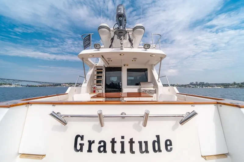Slide: The Image of 2005 Ocean Alexander 64 Motoryacht "Gratitude" on water, clear sky background. - 51