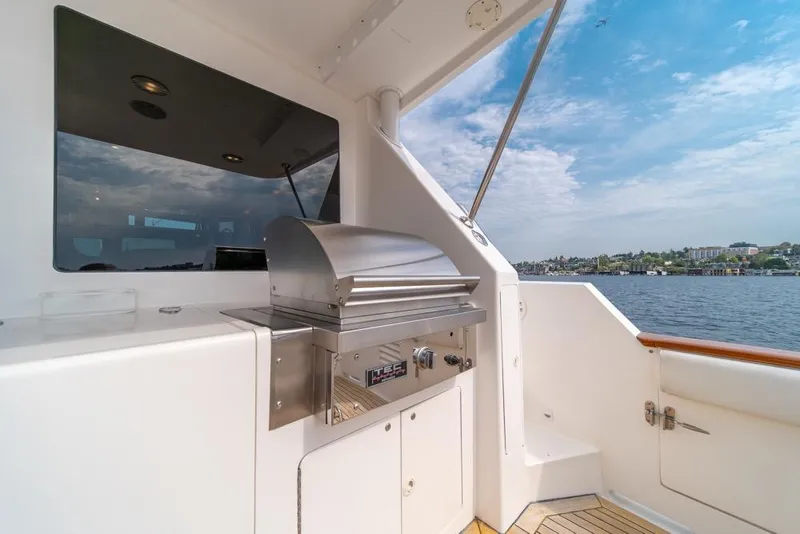Slide: The Image of Outdoor grill on 2005 Ocean Alexander 64 Motoryacht with scenic water view. - 52
