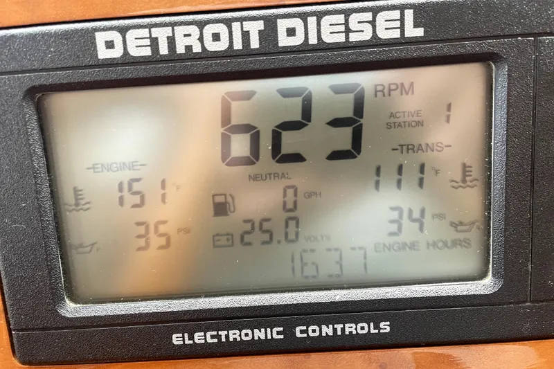 Slide: The Image of Detroit Diesel electronic control panel on 2005 Ocean Alexander 64 yacht, showing engine data. - 62