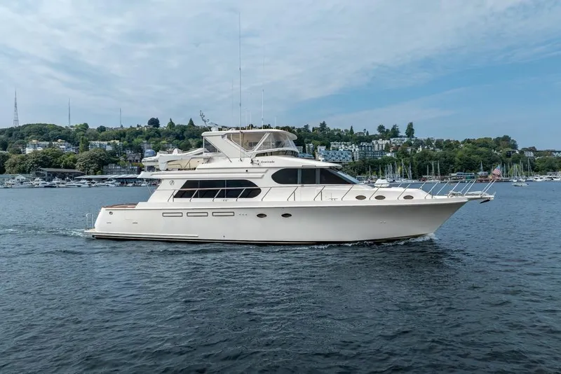 Slide: The Image of 2005 Ocean Alexander 64 Motoryacht cruising on a scenic waterway. - 8