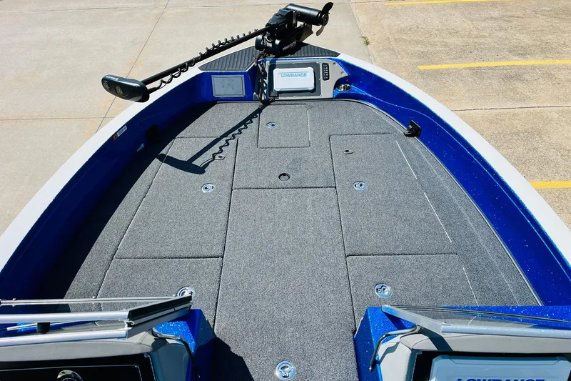 Slide: The Image of 2024 Ranger 620FS Pro boat deck with advanced navigation system and trolling motor. - 12