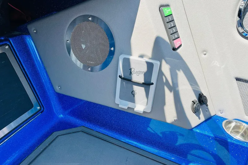 Slide: The Image of 2024 Ranger 620FS Pro boat interior with speaker and control panel. - 53
