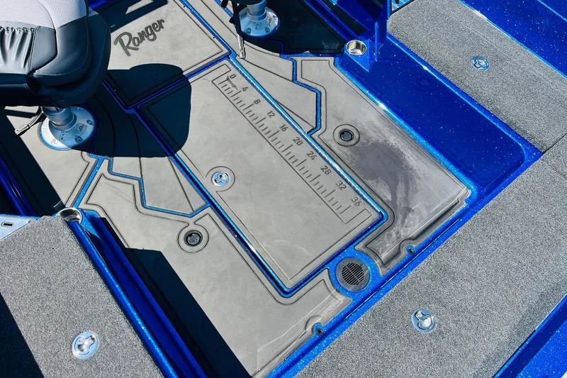 Slide: The Image of 2024 Ranger 620FS Pro boat interior with measurement ruler and seating. - 54