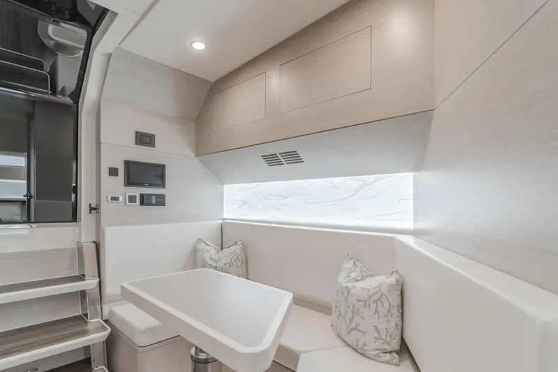 Slide: The Image of Luxurious interior of 2023 Scout 530 LXF yacht with modern seating and elegant design. - 2