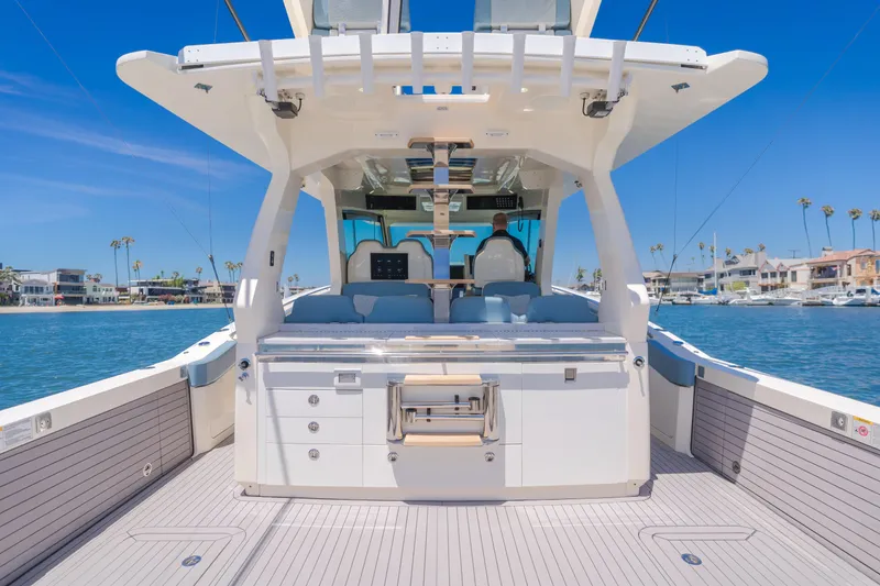 Slide: The Image of 2023 Scout 530 LXF luxury boat interior with ocean view and modern amenities. - 8