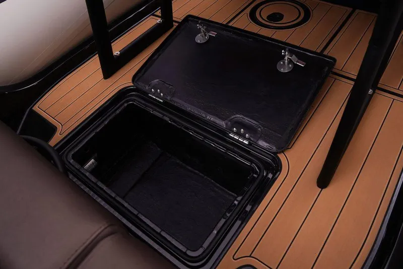 Slide: The Image of 2026 Brig Navigator 22 boat deck with wooden finish and metal fittings. - 12