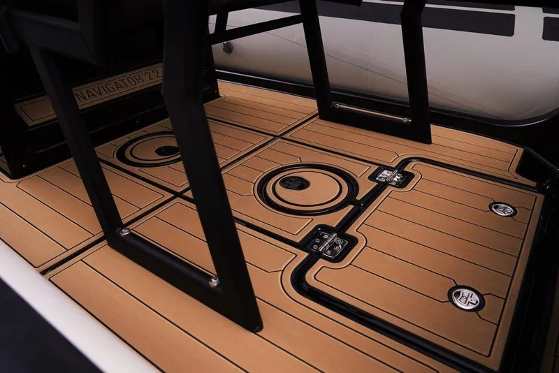 Slide: The Image of 2026 Brig Navigator 22 boat interior with modern design and wooden flooring. - 5