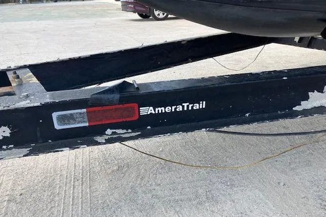 Slide: The Image of AmeraTrail trailer with visible wear, Sterling 22-6, 2007 model, parked on concrete. - 16