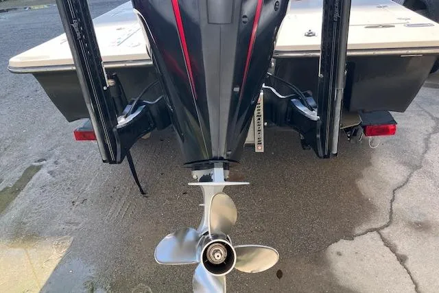 Slide: The Image of Rear view of a 2007 Dutch Sterling 22 boat with visible propeller and motor. - 3