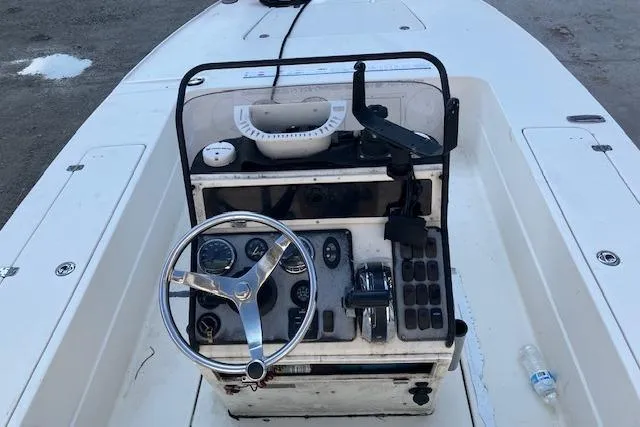Slide: The Image of Steering console of a 2007 Dutch Sterling 22 boat with controls and gauges. - 6