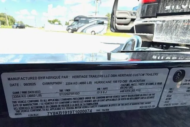 Slide: The Image of Label on a 2026 Hurricane FD198RE-OB trailer, showing specifications and compliance details. - 11