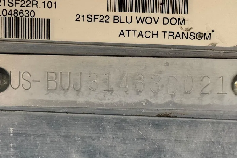 Slide: The Image of 2021 Sun Tracker SportFish 22 DLX hull identification number and barcode details. - 30