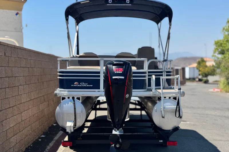 Slide: The Image of 2021 Sun Tracker SportFish 22 DLX pontoon boat with Mercury 115 Pro XS engine. - 6