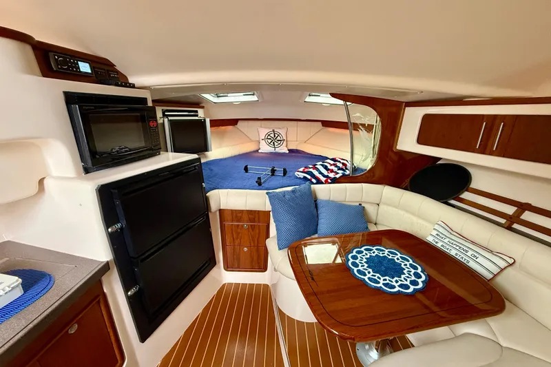 Slide: The Image of Luxurious 2008 Grady-White Express 360 cabin interior with cozy seating and modern amenities. - 10