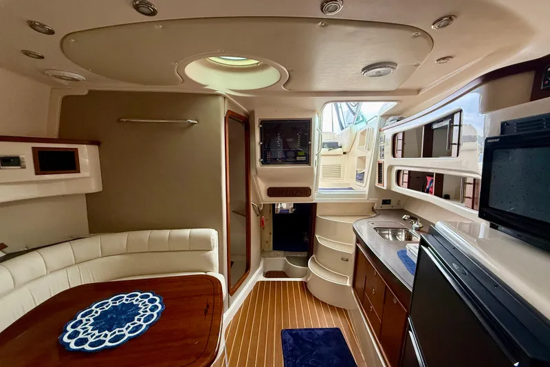 Slide: The Image of Luxurious interior of a 2008 Grady-White Express 360 boat with modern amenities. - 11