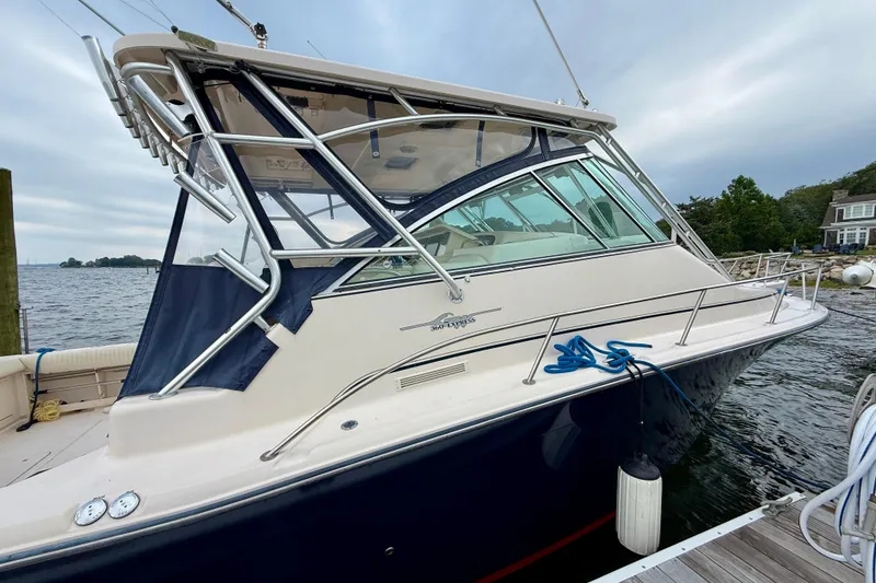 Slide: The Image of 2008 Grady-White Express 360 boat docked by the water on a cloudy day. - 17