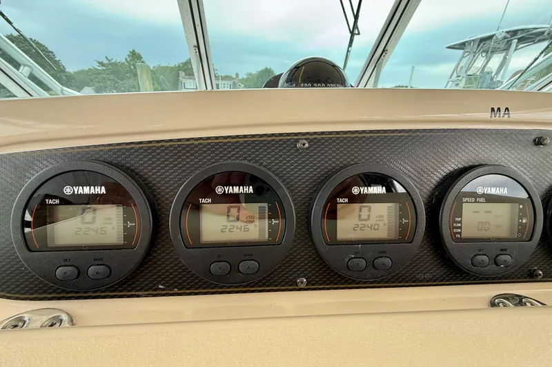 Slide: The Image of Dashboard of a 2008 Grady-White Express 360 with Yamaha gauges. - 4