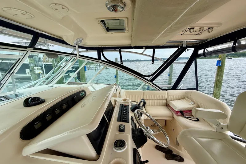 Slide: The Image of Interior view of 2008 Grady-White Express 360 boat, featuring helm and seating area. - 6
