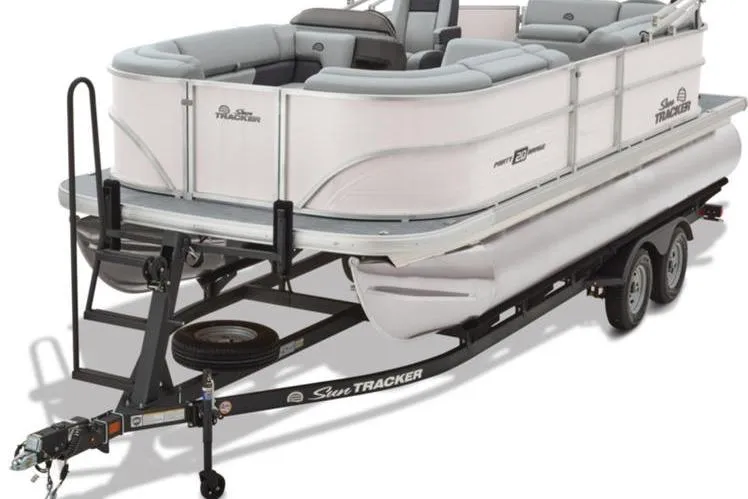 Slide: The Image of 2026 Sun Tracker Party Barge 20 DLX pontoon boat on trailer, side view. - 10