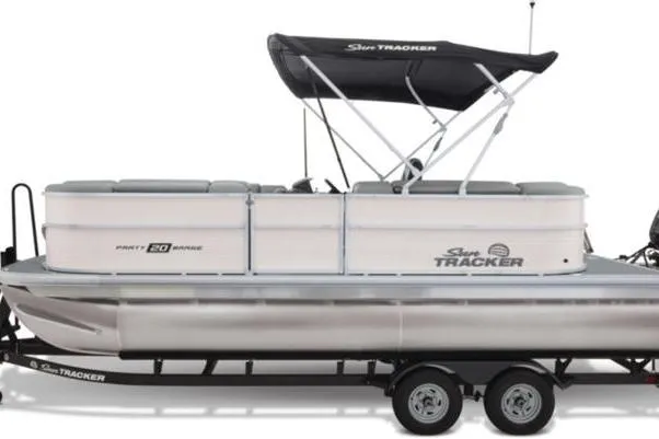 Slide: The Image of 2026 Sun Tracker Party Barge 20 DLX pontoon boat on trailer, side view. - 13
