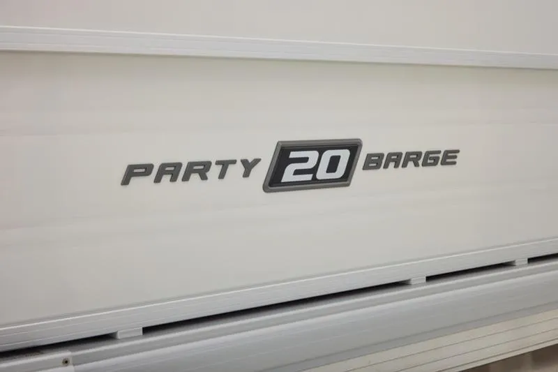 Slide: The Image of 2026 Sun Tracker Party Barge 20 DLX logo on white surface. - 19
