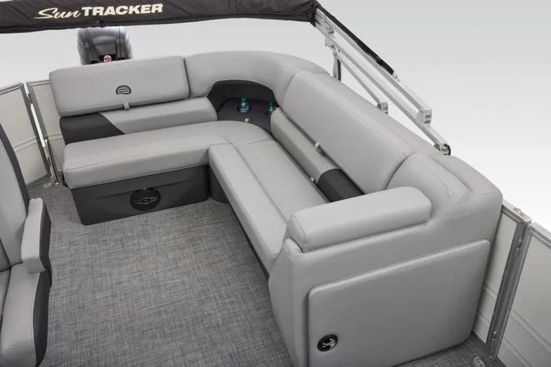 Slide: The Image of 2026 Sun Tracker Party Barge 20 DLX interior with gray seating and spacious layout. - 39