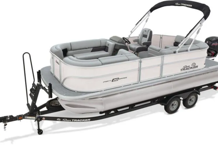 Slide: The Image of 2026 Sun Tracker Party Barge 20 DLX pontoon boat on trailer, side view. - 5