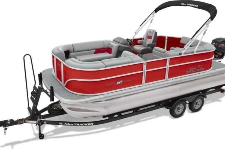 Slide: The Image of 2026 Sun Tracker Party Barge 20 DLX pontoon boat on trailer, red and gray design. - 6
