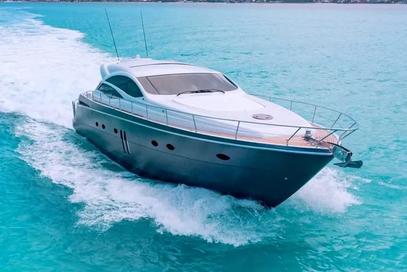 The Image of Luxurious 2007 Pershing 62 yacht cruising on turquoise waters. - 0