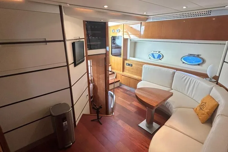 Slide: The Image of Luxurious interior of 2007 Pershing 62 yacht with elegant seating and modern decor. - 4