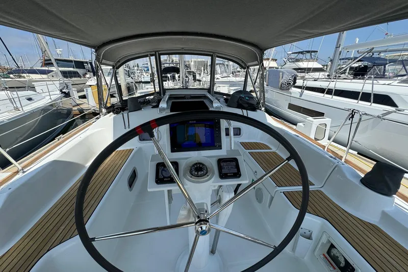 Slide: The Image of Cockpit view of 2017 Beneteau Oceanis 37 sailboat with steering wheel and navigation instruments. - 16