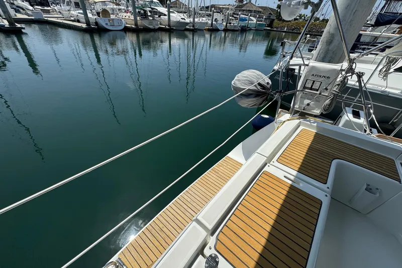 Slide: The Image of Beneteau Oceanis 37 sailboat deck, 2017 model, docked at a marina. - 21