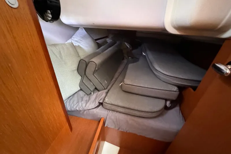 Slide: The Image of Cabin interior of 2017 Beneteau Oceanis 37 with cushions and bedding. - 30